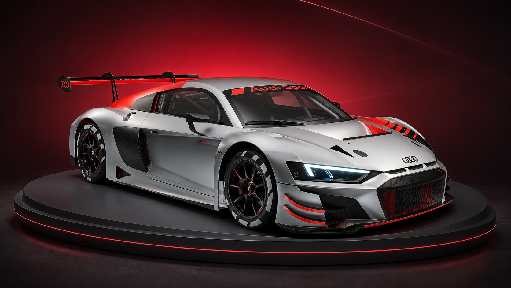 Audi R8 LMS GT3 Evo II – Racing Simulator Antalya Renkli ışık halesi önünde Audi R8 LMS GT3 Evo II yarış otomobili